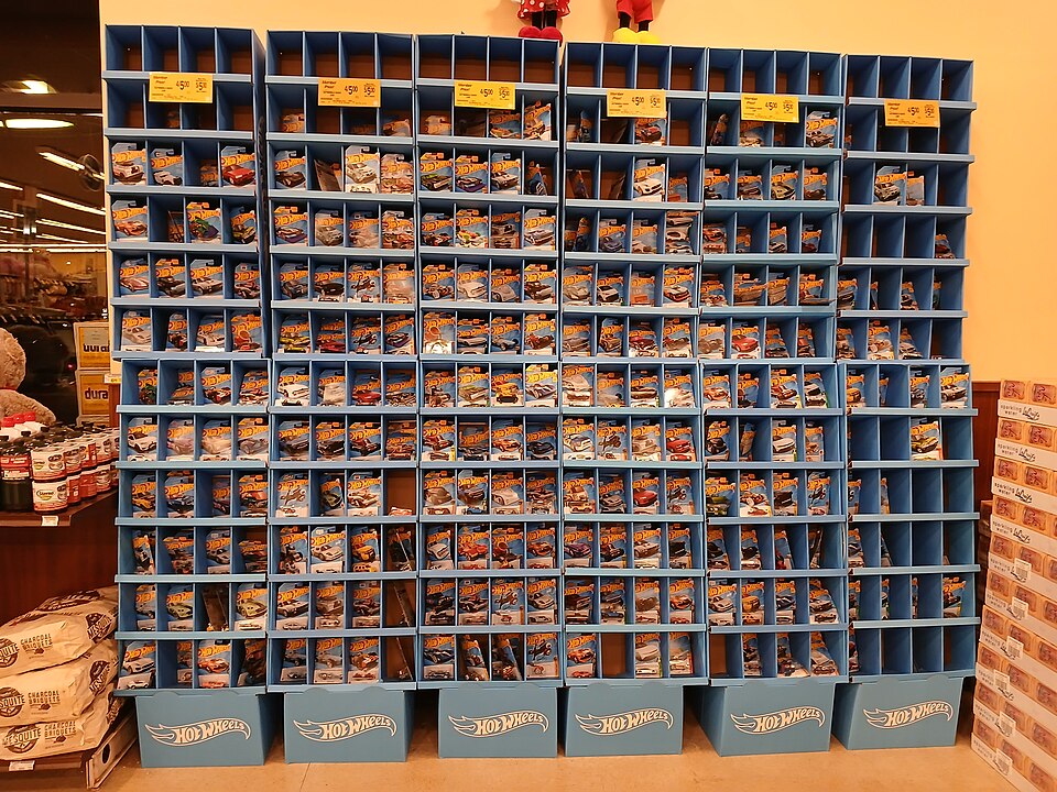 Large real retail display filled with individual Hot Wheels cars