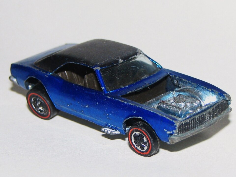 Real 1968 Hot Wheels Custom Camaro with red-stripe tires