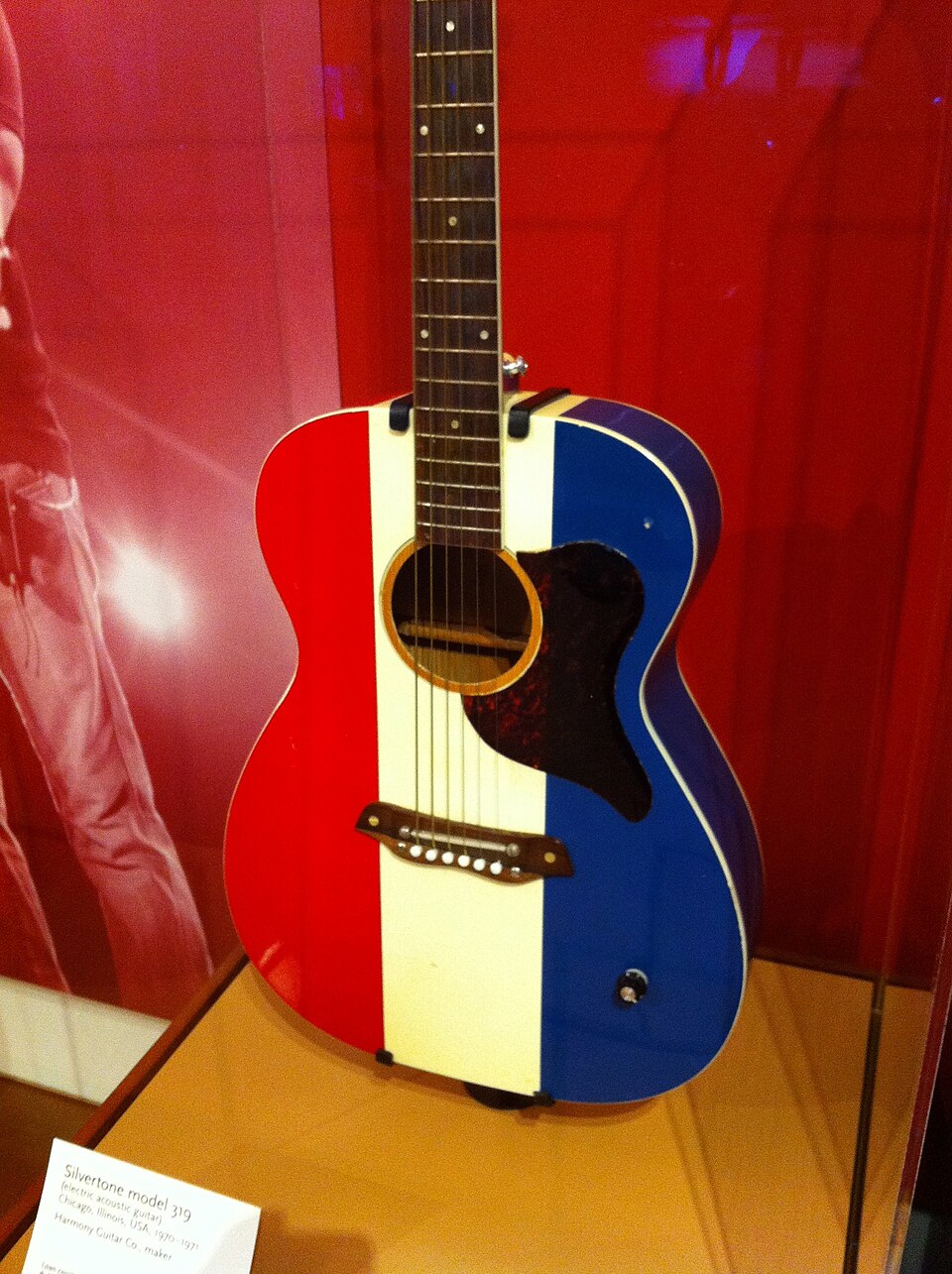 Real Silvertone model 319 guitar displayed with its museum label