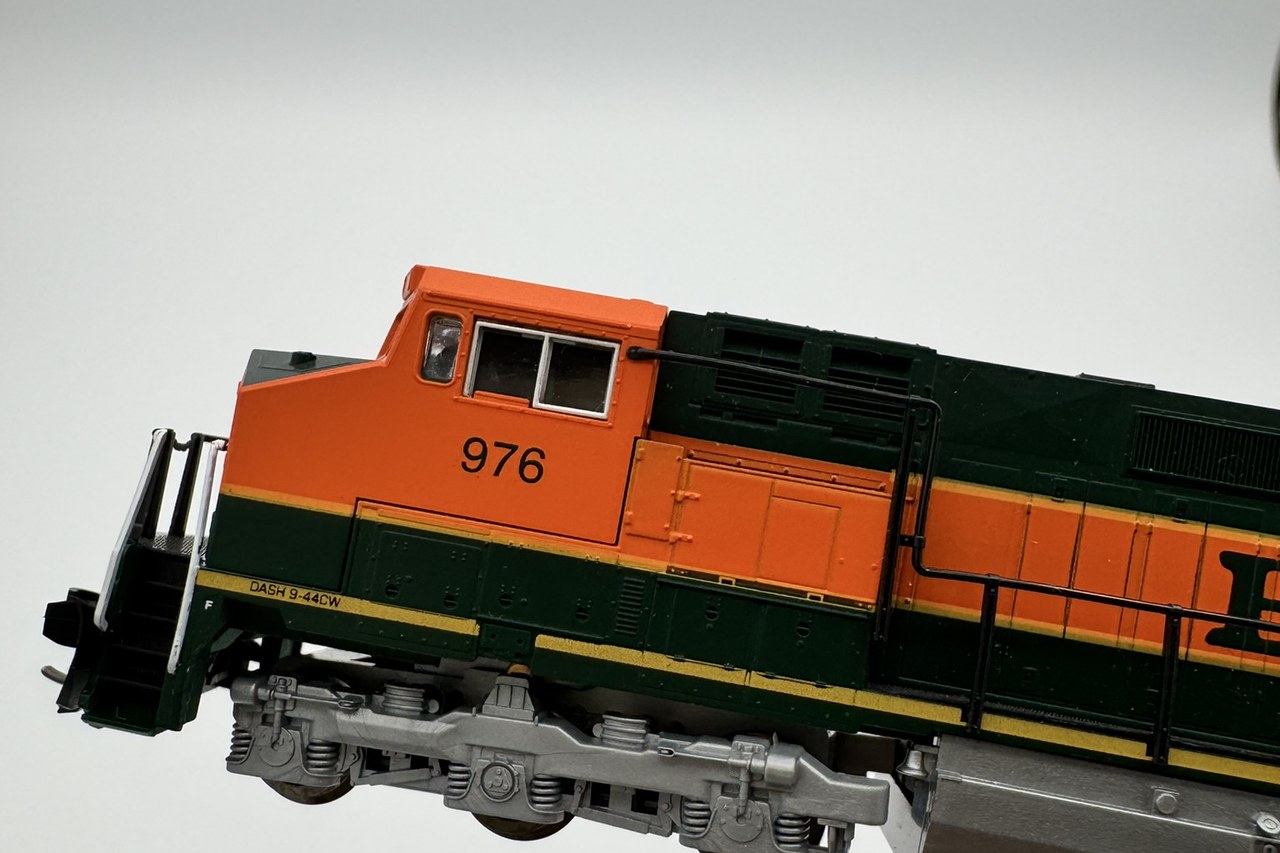Real KATO BNSF locomotive cab showing road number 976 and Dash 9-44CW lettering