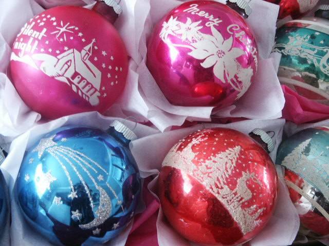 Real vintage Shiny Brite glass ornaments showing printed motifs and surface wear