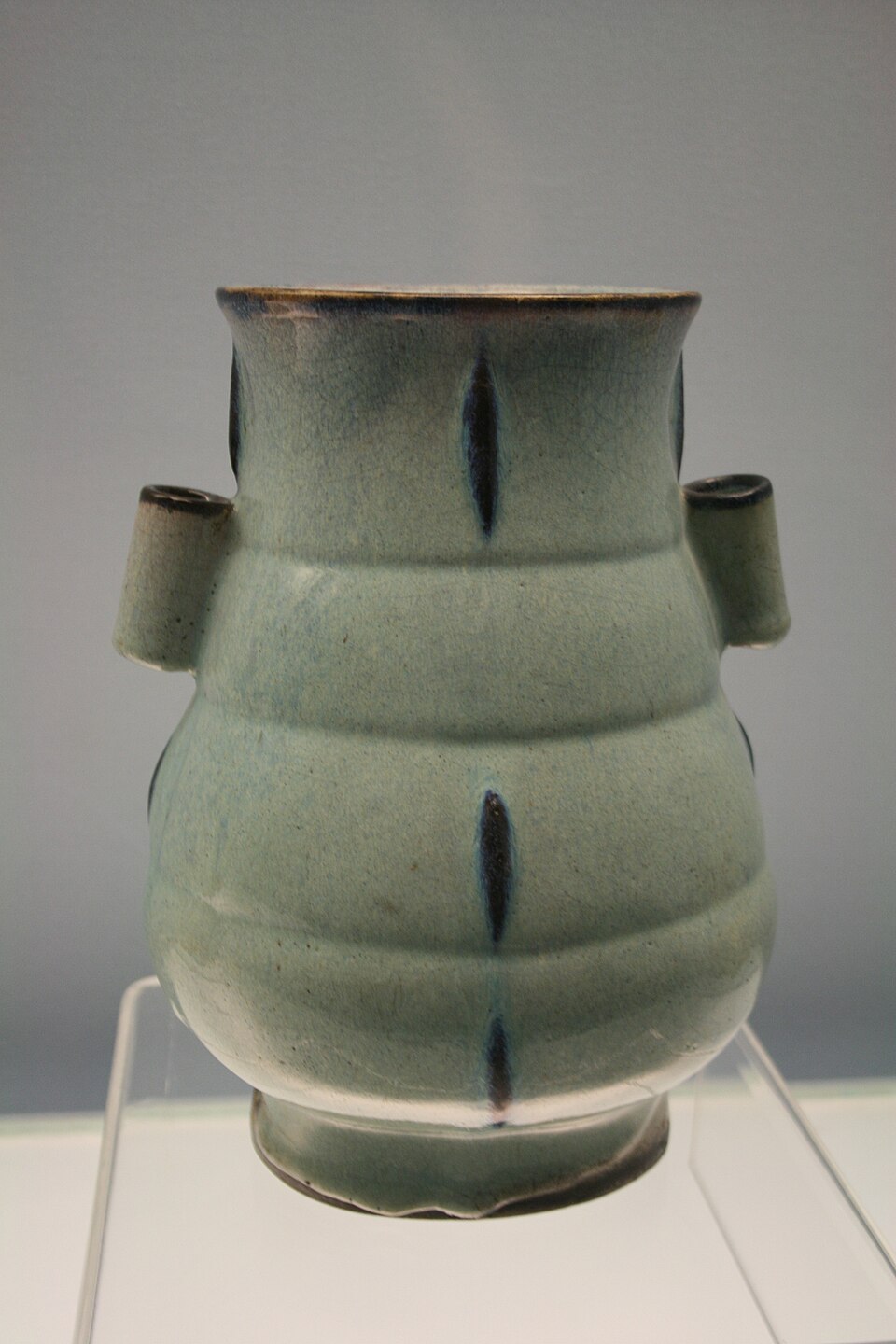 Real museum-held Shiwan vessel with contrasting glaze and exposed rim